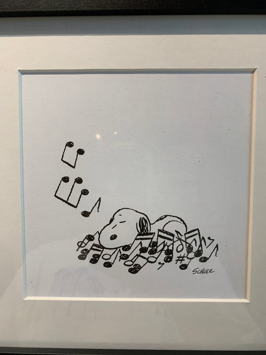 peanuts bed of notes framed print