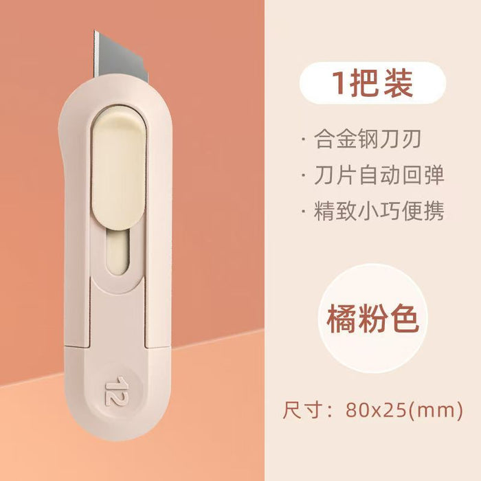 Deli Nusign Self Retractable Mini Cutter Knife 1PCS Pink 得力纽赛迷你便携式自回弹美工刀 橘粉色