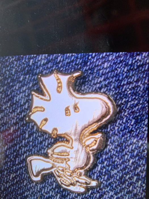 peanuts gold pin woodstock in flight